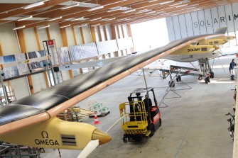 View taken on July 1, 2010 of an aircraft dubbed Solar Impulse, HB-SIA prototype in a warehouse in Payerne. AFP View taken on July 1, 2010 of an aircraft dubbed Solar Impulse, HB-SIA prototype in a warehouse in Payerne. AFP